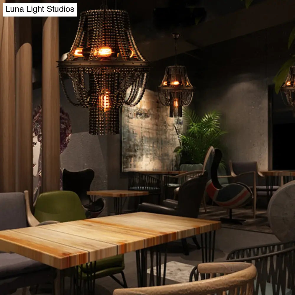 Lámpara colgante industrial de hierro negro con 4 luces