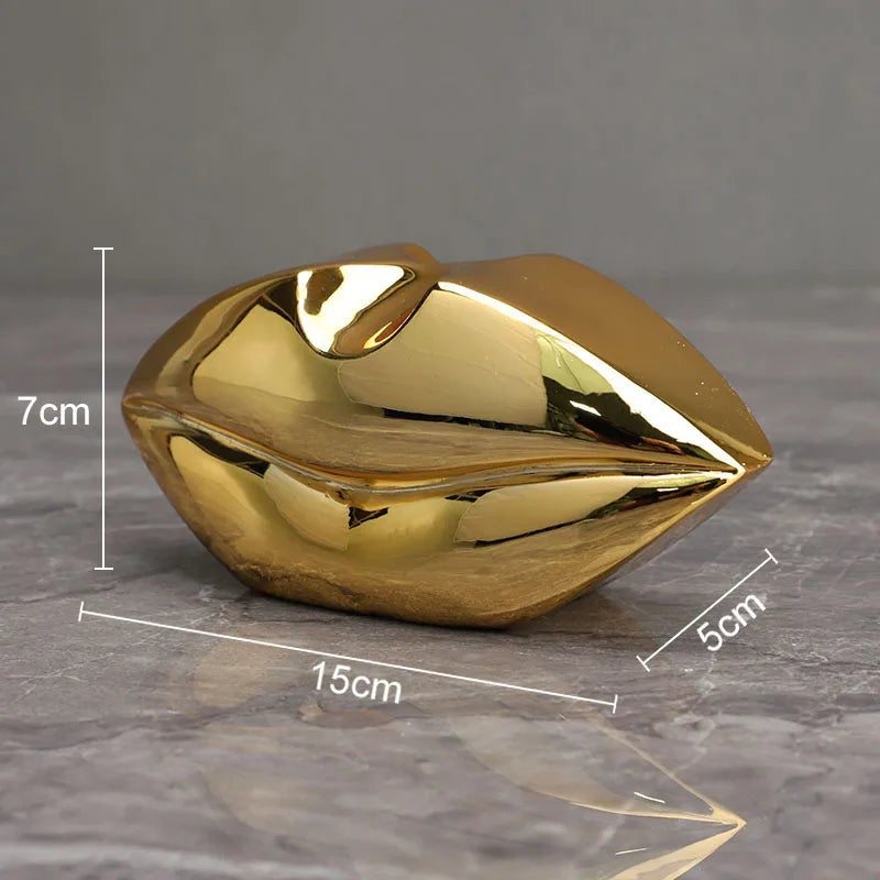 Figuras de resina DecorBites™ con labios y piernas doradas para decoración moderna del hogar.