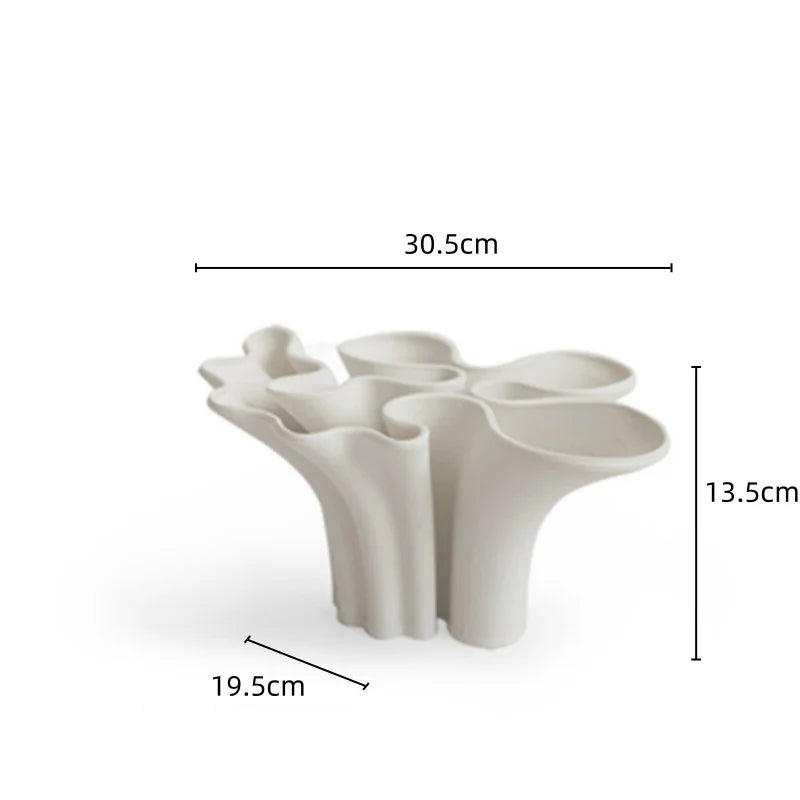 مزهرية سيراميك بتصميم هندسي تجريدي من DecorBites™ لتنسيق الزهور