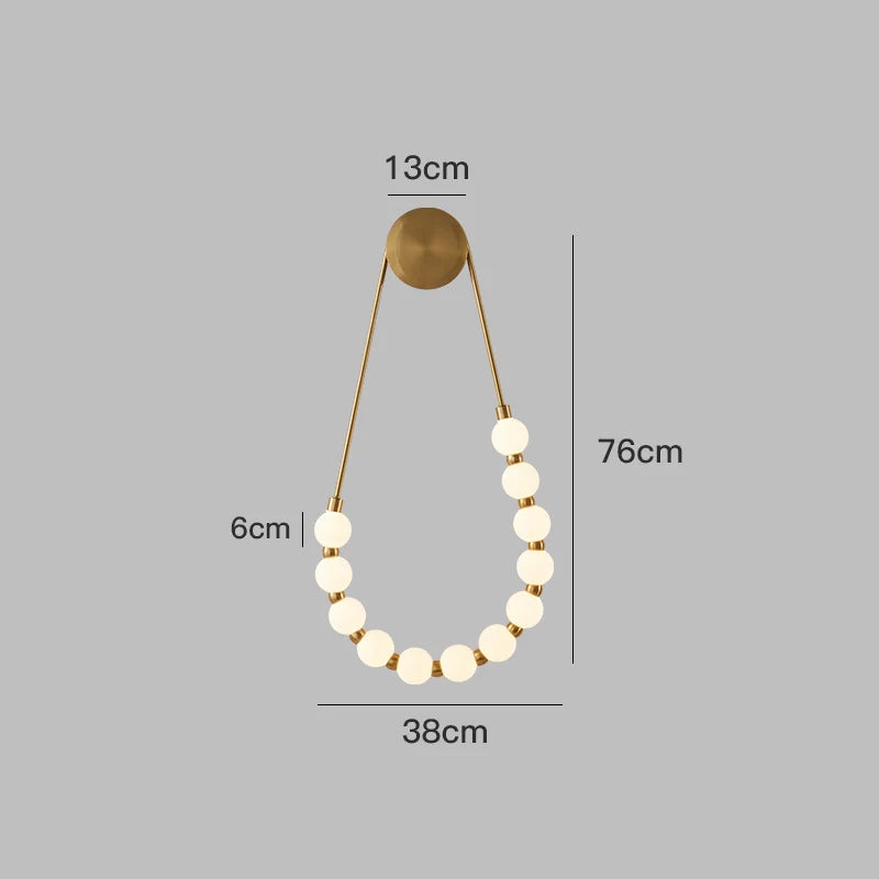 Lámpara de pared asimétrica DecorBites™ estilo italiano color crema con forma de haba mágica