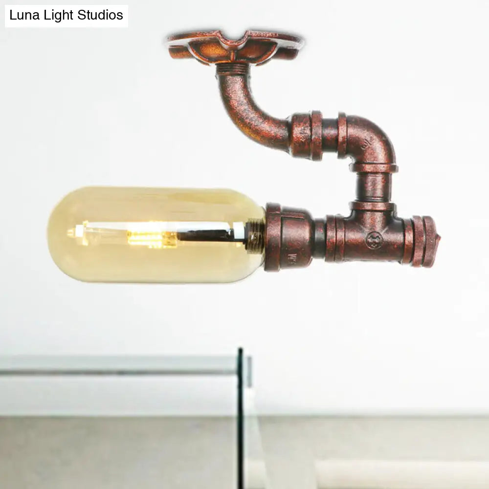 وحدة إضاءة بيضاوية شبه مستوية من ديكوربايتس™ مصنوعة من زجاج العنبر والنحاس المتآكل بتصميم أنابيب صناعية لغرفة المعيشة