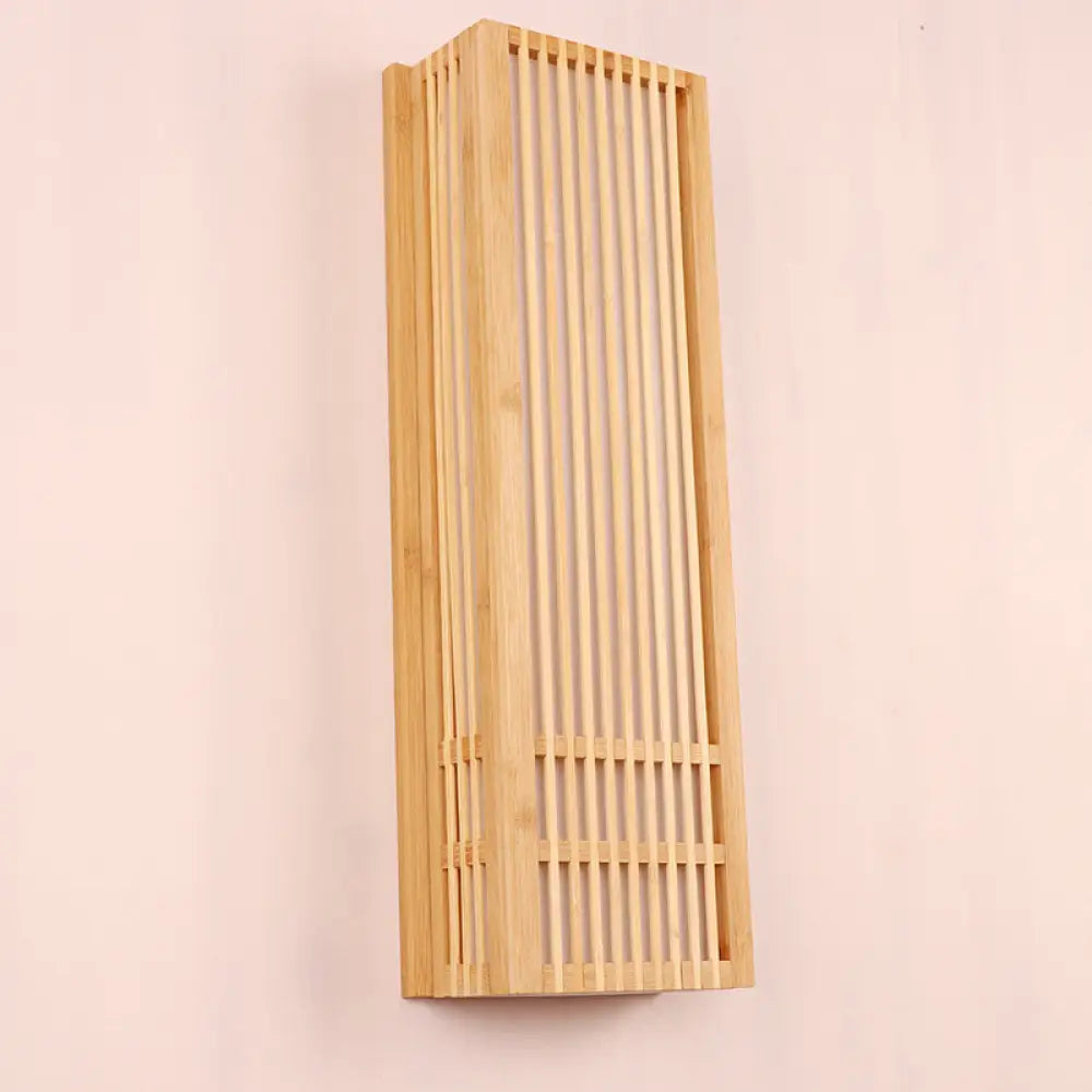 As an AI language model, I can suggest a revised product title that maintains the essential information while being more concise and SEO-friendly:
"Beige Asian Style Wooden Wall Sconce - Rectangular Single Bulb Mount for Bedroom Lighting