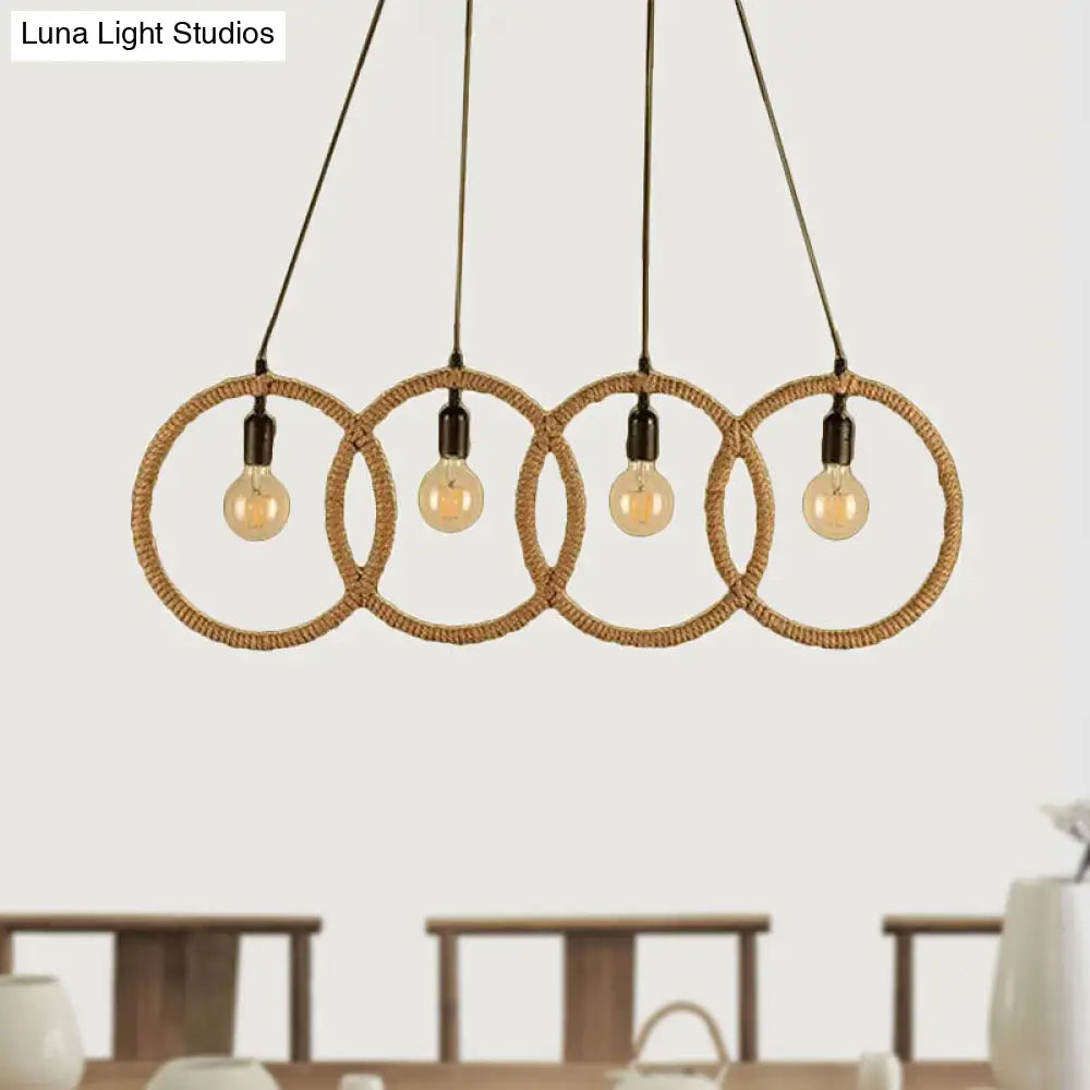 Lámpara colgante de estilo rústico con cuatro anillos y acabado negro, con cuerda de manila - 4 luces para cafetería