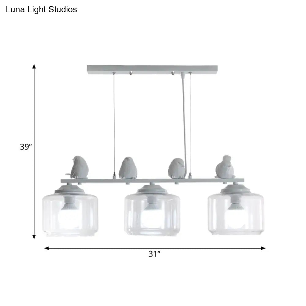 DecorBites™ Clear Glass 3-Bulb Island Lighting Fixture: Traditional White Hanging Light Kit with Birds - Perfect for Dining Room"
Note: The revised title focuses on the essential components while keeping it concise.