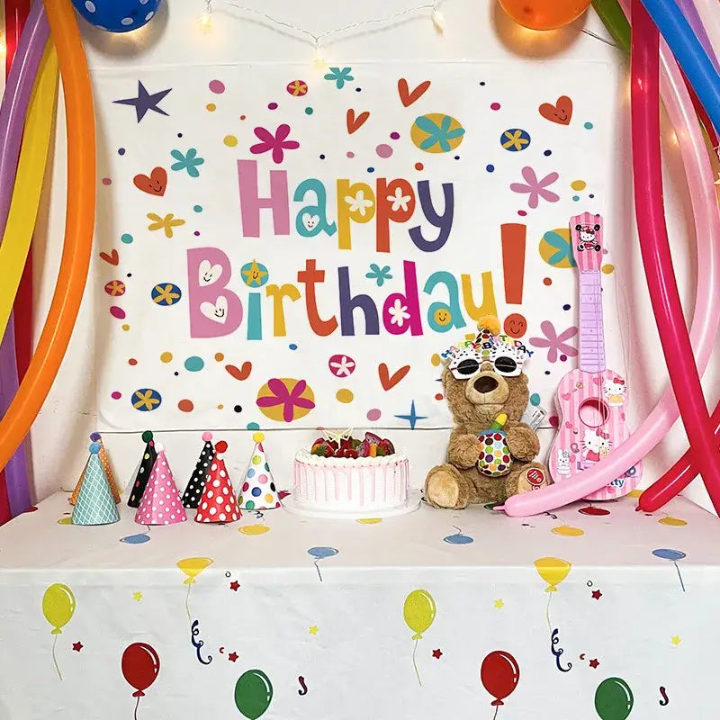 A colorful cartoon animal birthday wall tapestry featuring a plush brown teddy bear with party accessories for decorbites birthday wall decor