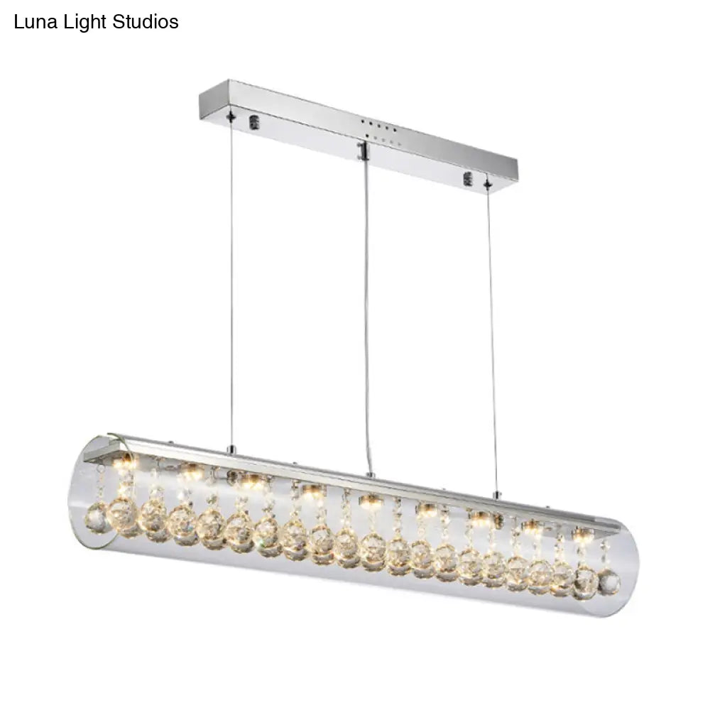 Lámpara colgante de isla DecorBites™ de cristal contemporáneo con 5 luces cilíndricas horizontales y detalle de bola de cristal.