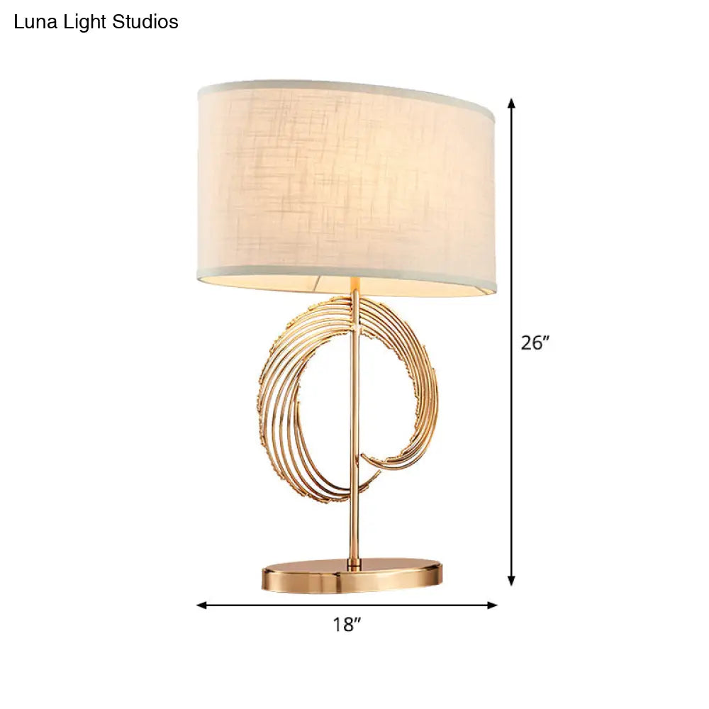 Lámpara de mesa contemporánea dorada estilo tambor - Elegante lámpara de dormitorio