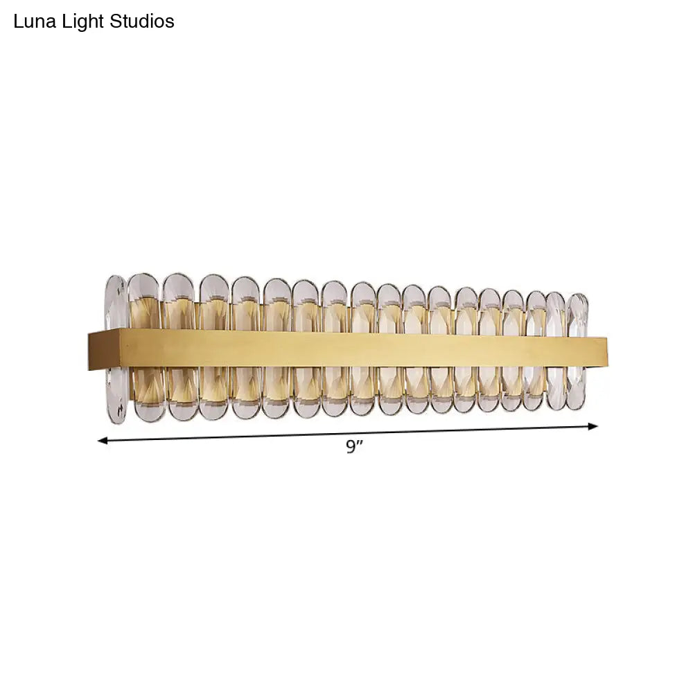 Aplique de pared para baño DecorBites™ contemporáneo dorado con LED y cristales ovalados transparentes