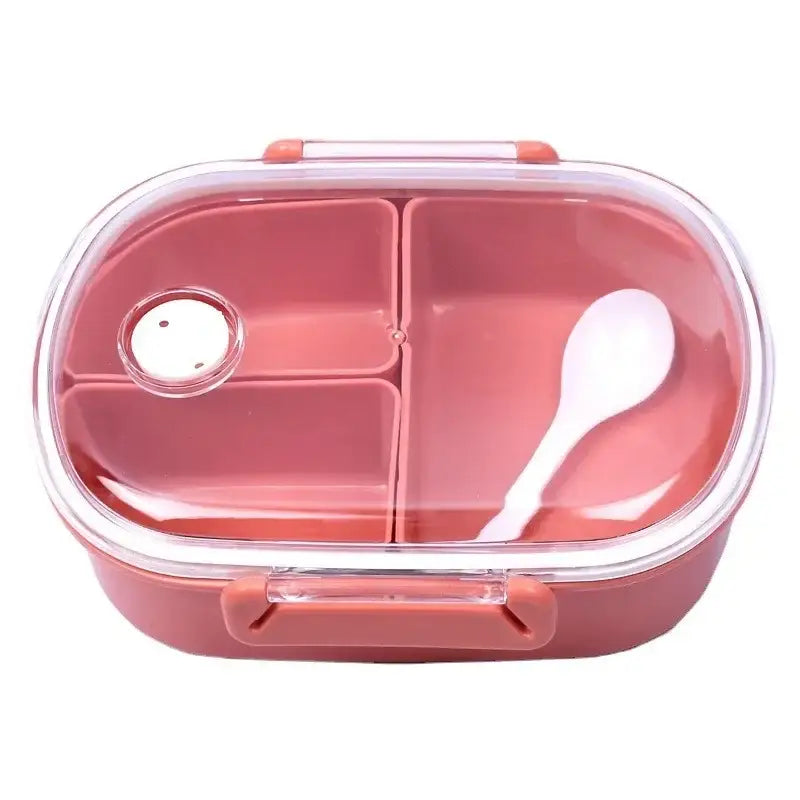 Coral and white lunch box set featuring a pink plastic three compartment bento box with clear lid and white spoon inside