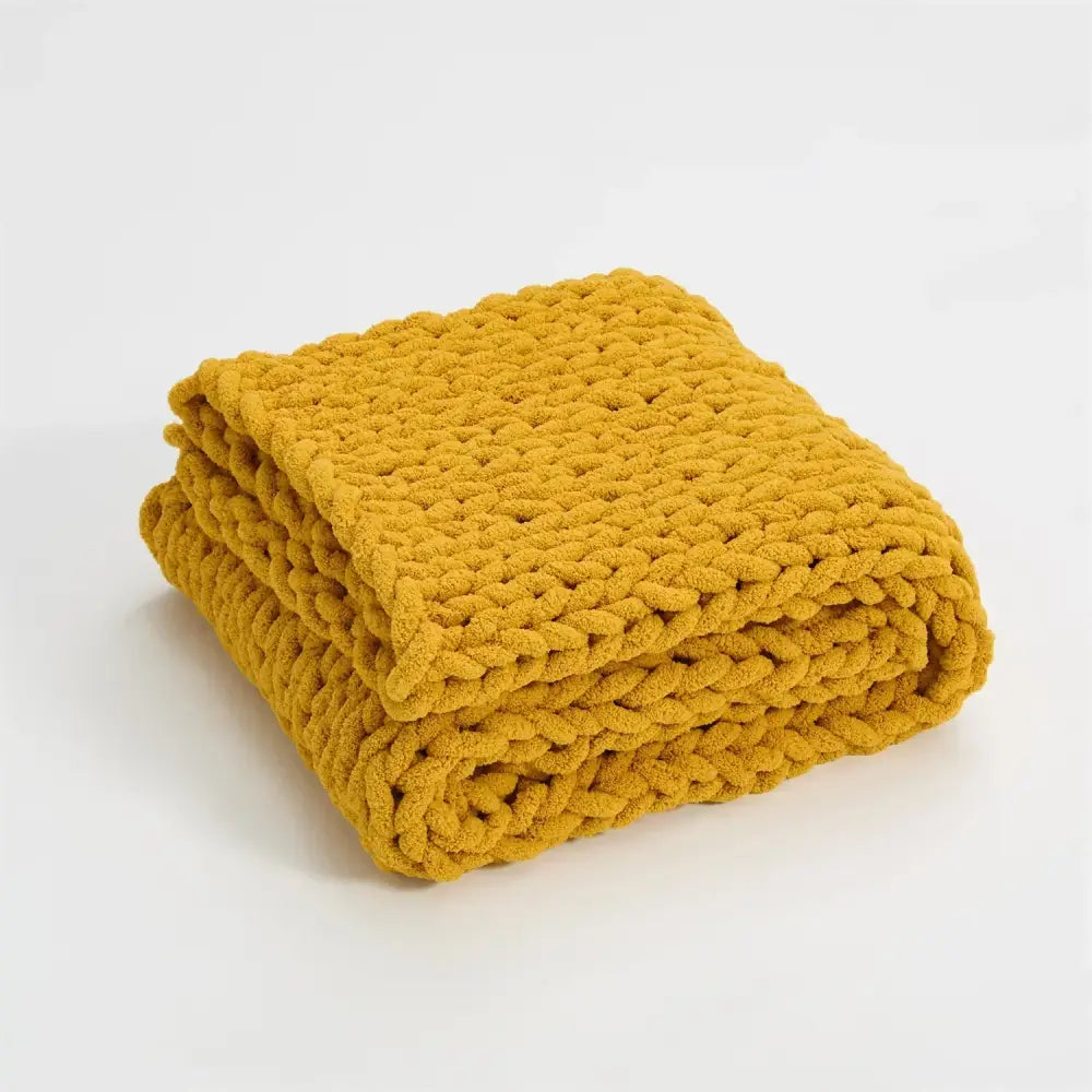 A plush mustard-yellow chenille chunky knit throw blanket with a cozy textured surface for bedroom decorbites cozy chenille