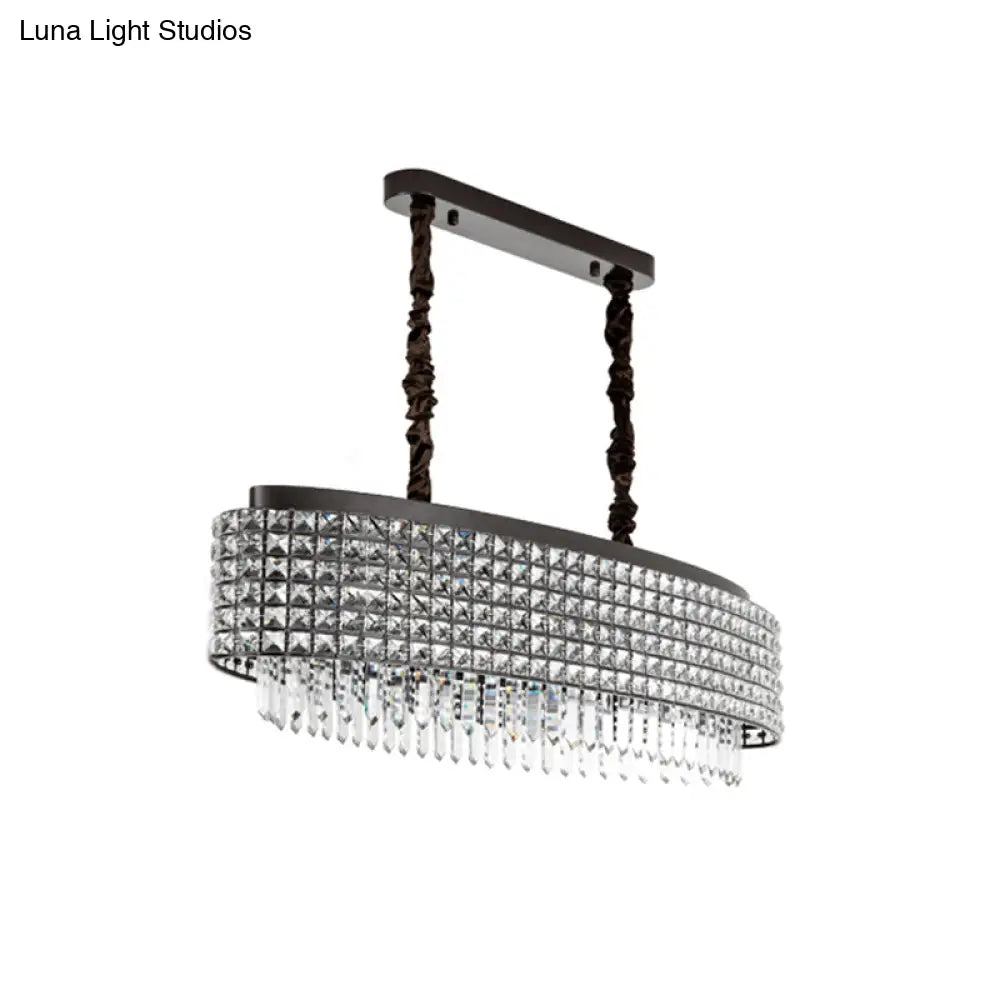 Lámpara de isla oblonga DecorBites™ con incrustaciones de cristal y diseño moderno de 5 luces en acabado negro.