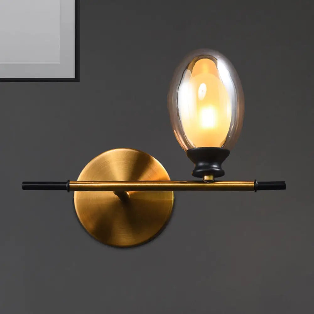 DecorBites™ DecorBites™ Elegant Clear/Amber Glass Egg Shape Wall Light - Minimalist 1 Light Brass Sconce