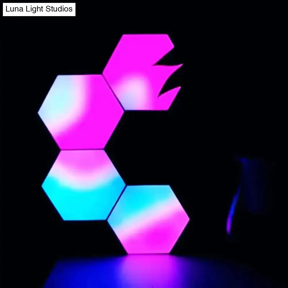 Vibrant pink and blue geometric hexagon led wall lights with bluetooth app control for bedroom ambiance