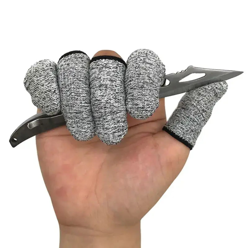 Gray knitted finger protector sleeves with black trim designed for safe handling of sharp objects in kitchen use