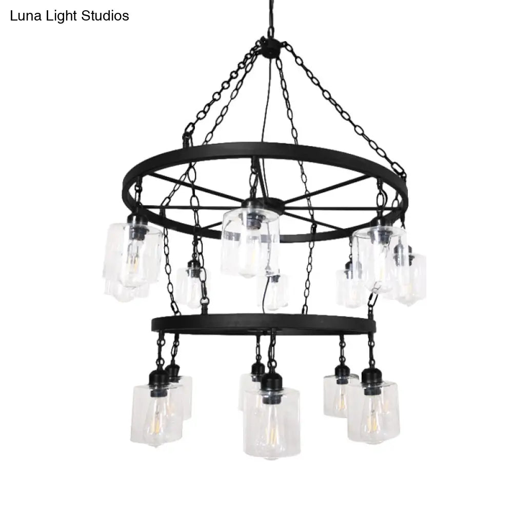 Lámpara colgante industrial DecorBites™: Lámpara de dos niveles con múltiples luces, pantalla cilíndrica y cristal transparente con acabado negro.