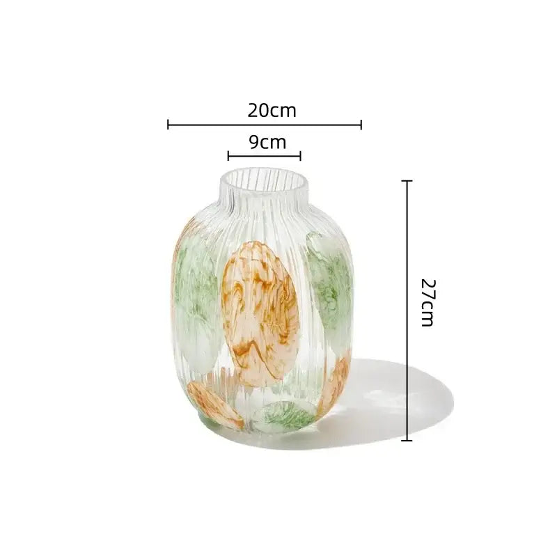 Clear glass vase with irregular ribbed texture and hand-painted green and amber botanical motifs for living room decorbites clear glass decor
