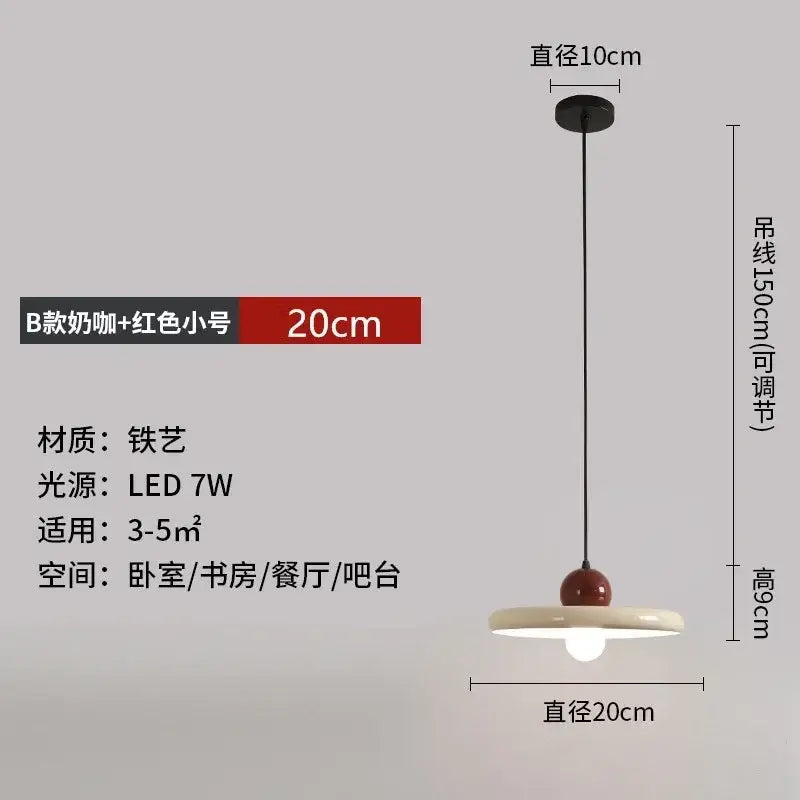 Minimalist red and white acrylic pendant light with matte cream ceramic shade and cord pendant for dining room lighting