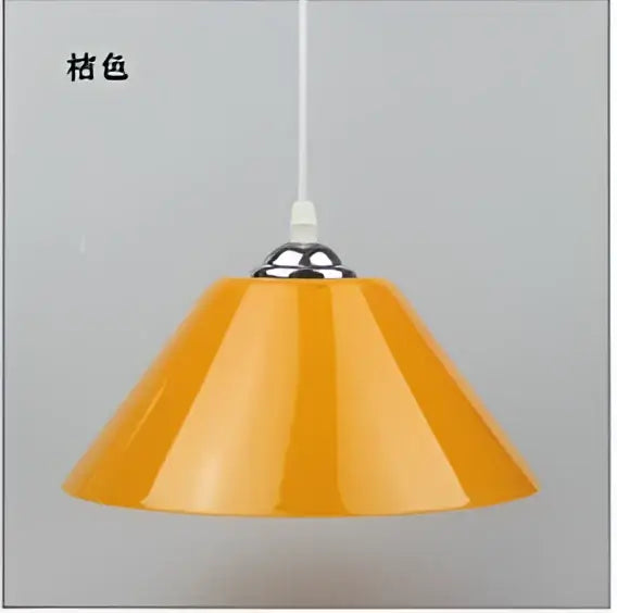 Modern amber glass pendant light with an iron finish and orange conical shade for dining room lighting