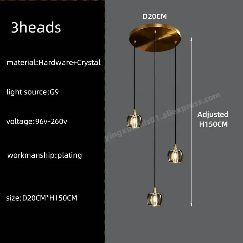 Gold-plated three-head pendant light with crystal glass shades and black cords in modern black and gold crystal chandelier led design