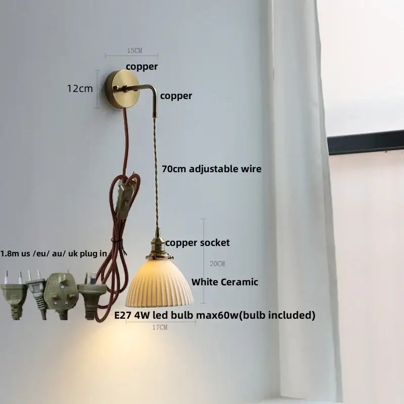 Modern brass crystal wall lamp featuring a copper finish with white ceramic fluted shade and adjustable wire for bathroom mirror lighting decorbites clear glass