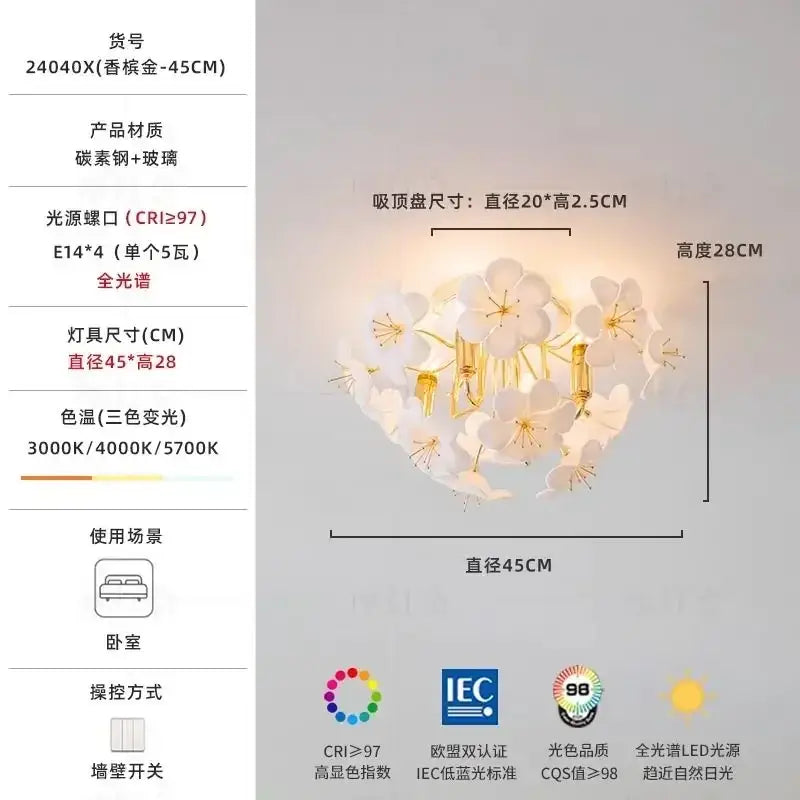 Delicate white cherry blossom pendant light with gold metal finish providing practical illumination for kitchens