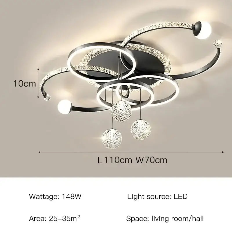 Modern black and crystal-encrusted dimmable led pendant light with spherical ornaments ideal for dining rooms