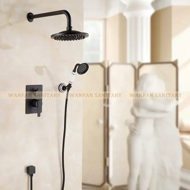 Modern matte black bath rain shower faucet set with fixed overhead rainhead and handheld unit featuring white handle