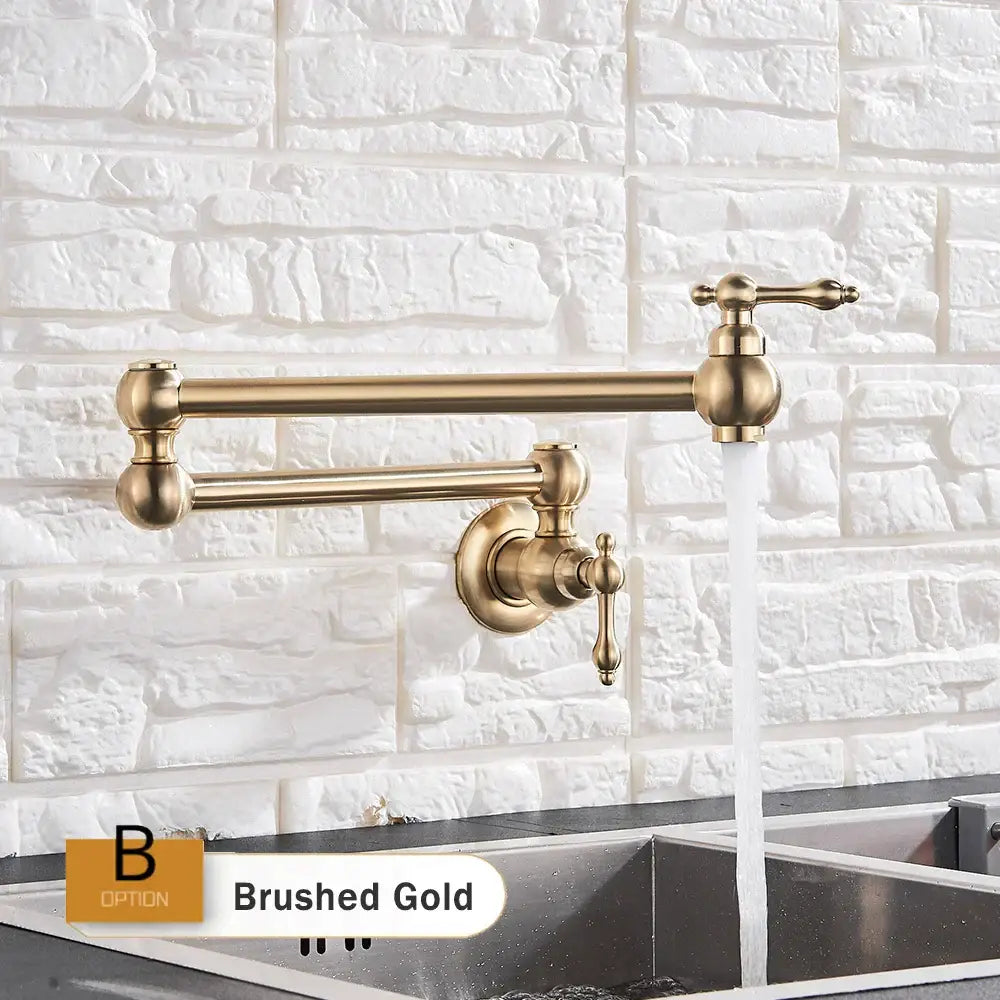 Brushed gold kitchen faucet with classic elongated design and ornate handles for decorbites double joint spout use