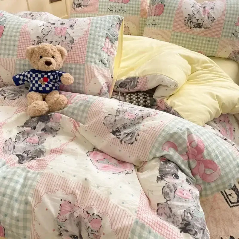 A plush teddy bear in a blue and white checkered shirt sits on a pink floral lace cotton comforter set cozy cartoon printed