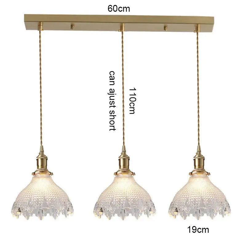 Gold-toned three-light pendant light with textured glass shades wood accent and adjustable cords for dining room e27 led bulb
