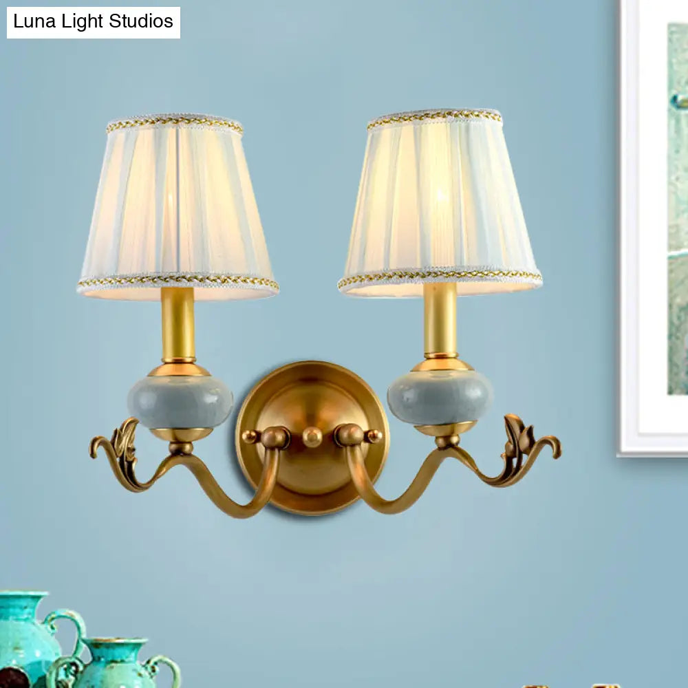 Traditional Style Brass Wall Sconce with Curved Arm, Fabric Shade