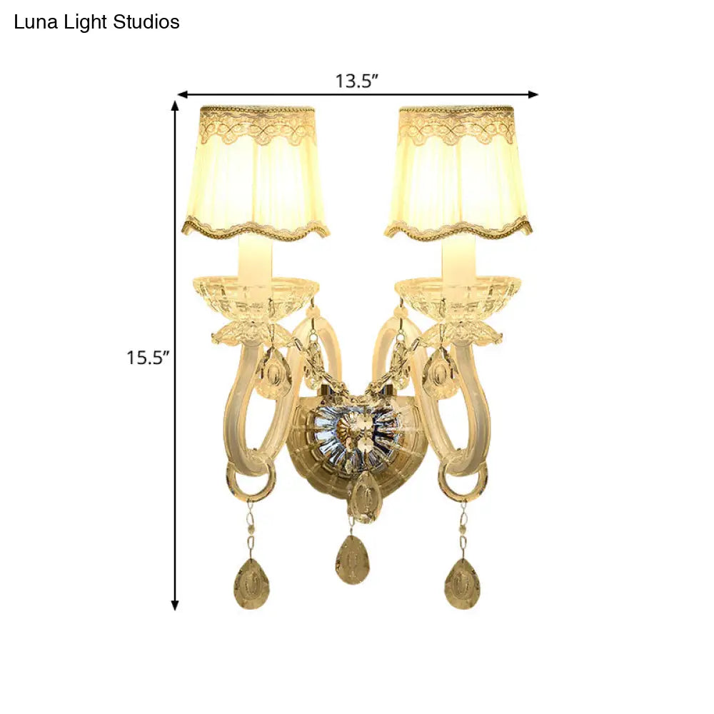 Traditional White Candle Wall Lamp with Clear Crystal Accent and Scalloped Fabric Shade