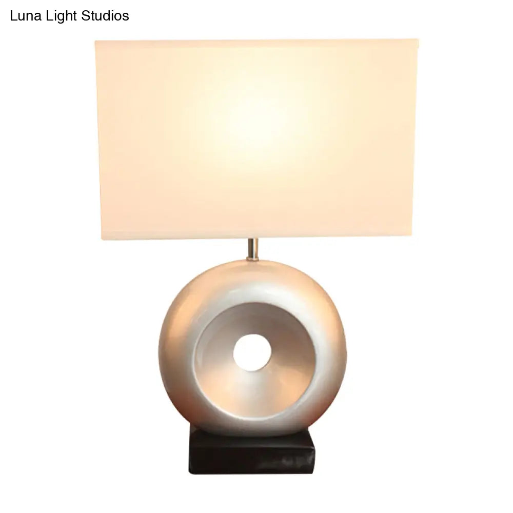 Transitional Resin Table Light with Silver/Black Finish, Rectangle/Drum Fabric Shade, and 1 Bulb
