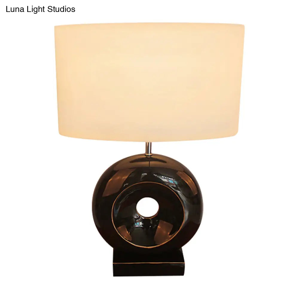 Transitional Resin Table Light with Silver/Black Finish, Rectangle/Drum Fabric Shade, and 1 Bulb