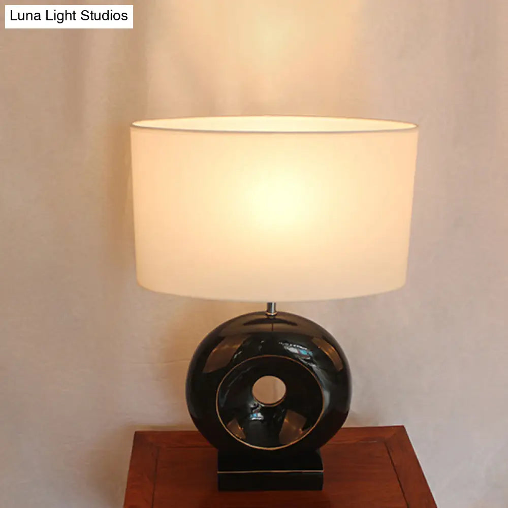 Transitional Resin Table Light with Silver/Black Finish, Rectangle/Drum Fabric Shade, and 1 Bulb