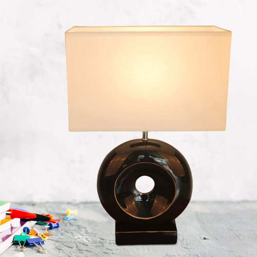 Transitional Resin Table Light with Silver/Black Finish, Rectangle/Drum Fabric Shade, and 1 Bulb