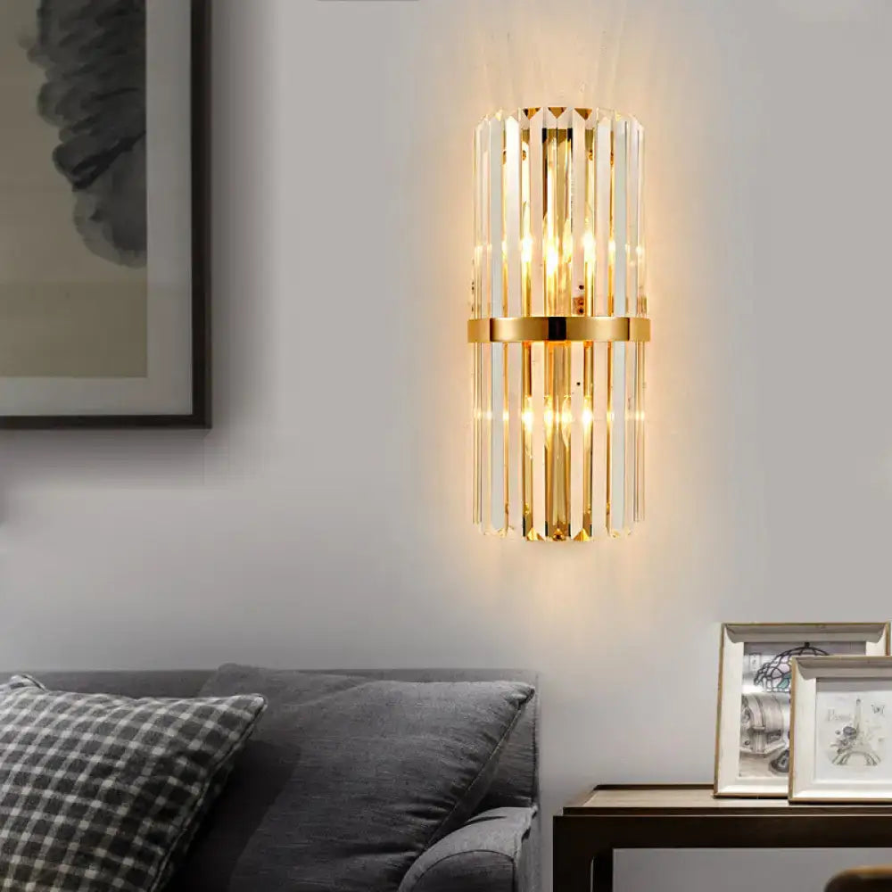 Vintage brass crystal wall lamp with gold-toned vertical crystal rods and central brass band for living room wall lamp