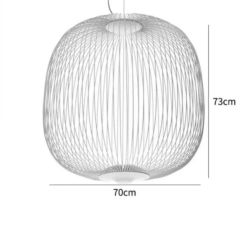 A modern spherical pendant light with a woven wireframe design in polished chrome finish for dining room use