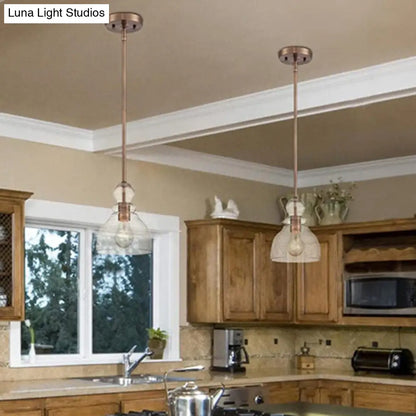 Lámpara colgante industrial de una bombilla con forma de calabaza y cristal texturizado para barra de cafetería