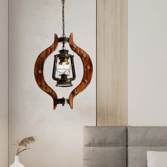 1-Light Iron Hanging Lantern: Warehouse Brass Pendant Lamp with Clear Glass and Wood Frame