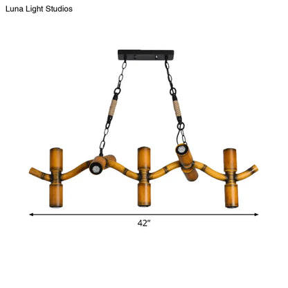 DecorBites™ 10-Light Metal Island Pendant in Brown with Wave Style, Pipe Shade, and Rope Detail".