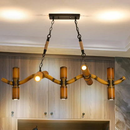 DecorBites™ 10-Light Metal Island Pendant in Brown with Wave Style, Pipe Shade, and Rope Detail".