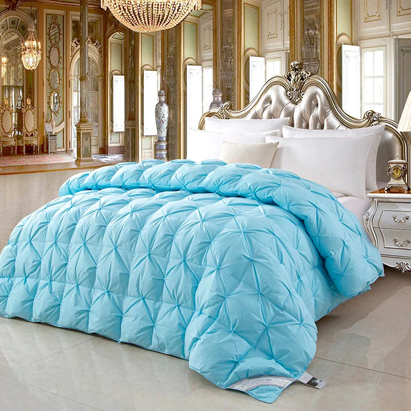 Light blue quilted 100% white goose down comforter with diamond stitch in pure cotton for winter warmth and luxury use