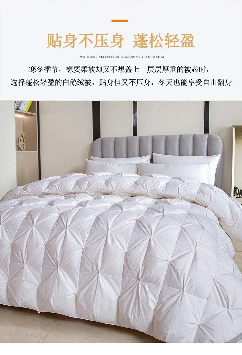 White quilted 100 percent goose down comforter with plush diamond pattern and velvet flower feather stem filling