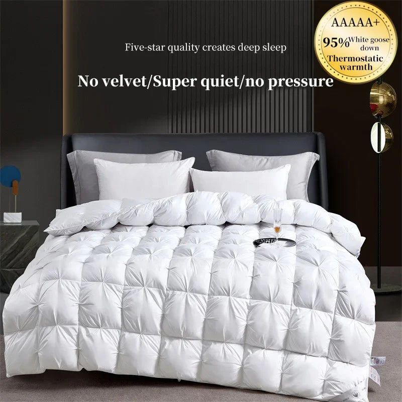 White quilted 100 percent goose down comforter with plush puffy texture and diamond stitching for winter use