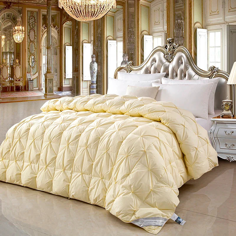 Cream-colored quilted comforter with diamond-stitched pattern made of 100% white goose down and pure cotton for winter use