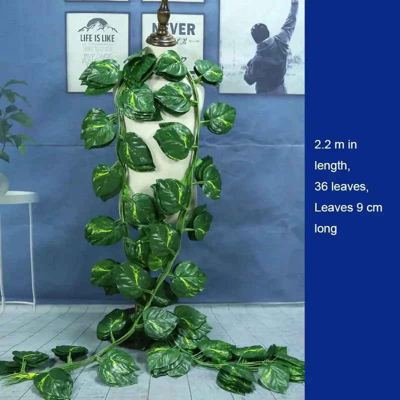 Green artificial pothos vine with glossy yellow variegation displayed on mannequin decorbites 12pcs ivy green garland string