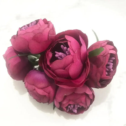 A cluster of 200pcs mixed rose red fabric peonies with purple stamens and green stems for bedroom diy decor