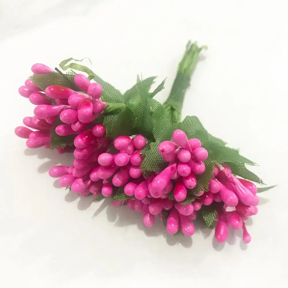 A cluster of vibrant pink artificial rose red flower stamens with glossy bead-like petals and green mesh stems for diy decor