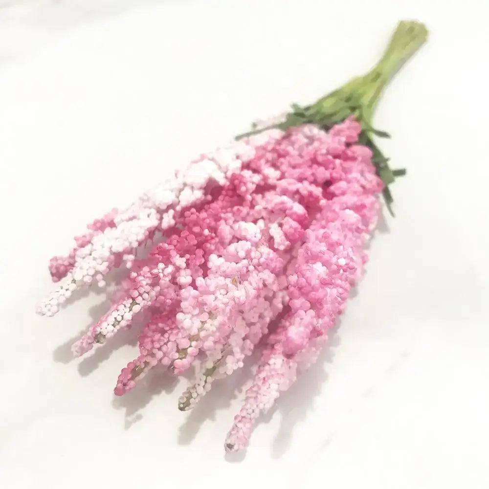 A delicate bouquet of 200pcs mixed rose red flower stamens with pink and white bead-like artificial petals for diy decor